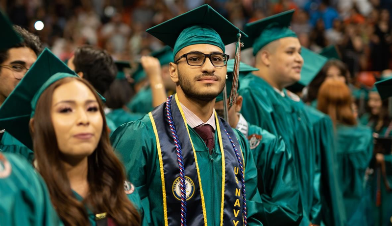 Student smiling at graduation